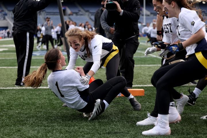 West Forsyth quarterback Haylee Dornan (1) celebrates with Caroline Coggin after Dornan scored the game-winning extra point in a 26-25 2-OT win over Hillgrove in the Class 6A-7A Flag Football championship at Center Parc Stadium Monday, December 28, 2020 in Atlanta. JASON GETZ FOR THE ATLANTA JOURNAL-CONSTITUTION