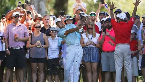 You have to admit, the guy draws a crowd, as here on the fifth hole Friday at the Tour Championship.  (Kevin C. Cox/Getty Images)