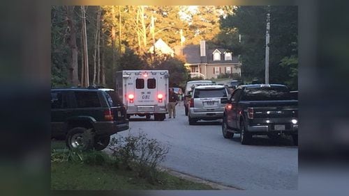 A suspect was shot and killed by a Paulding County deputy while authorities were serving a warrant.