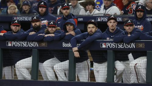 Braves players watches the action at the field as Braves tried to come back during the ninth inning against the Philadelphia Phillies in the Game 1 of the 2023 NLDS at Truist Park on Saturday, October 7, 2023, in Atlanta. 
Miguel Martinez / miguel.martinezjimenez@ajc.com 