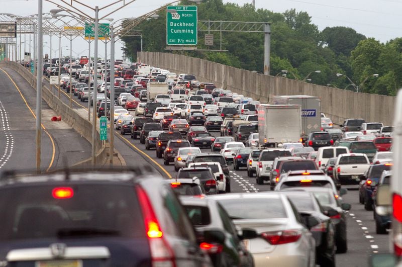 Cars are backed up as they opened the closed portion of the damaged northbound lanes of I-85 Friday, May 12, 2017.  STEVE SCHAEFER / SPECIAL TO THE AJC