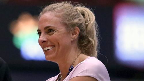 In this Aug. 12, 2018, file photo, Atlanta Dream coach Nicki Collen smiles during a WNBA basketball game against the New York Liberty, in New York. (AP Photo/Gregory Payan, File)