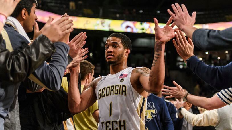 Georgia Tech guard Tadric Jackson (1) celebrates with fans after defeating North Carolina State in an NCAA college basketball game, in Atlanta, Thursday, March 1, 2018. (AP Photo/Danny Karnik)