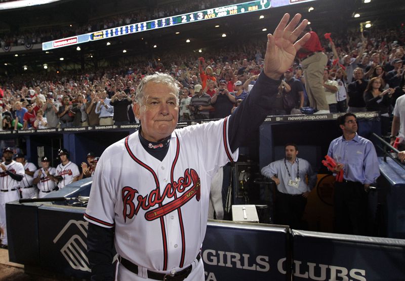 Bobby Cox waves to an adoring crowd at Turner Field after the final game of his managerial career, when the Braves were beaten in the 2010 division series. (AJC fiel photo)