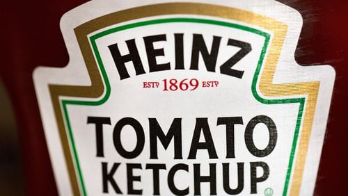 CHICAGO, IL - MARCH 25: In this photo illustration, Heinz Tomato Ketchup is shown on March 25, 2015 in Chicago, Illinois. Kraft Foods Group Inc. said it will merge with H.J. Heinz Co. to form the third largest food and beverage company in North America with revenue of about $28 billion. (Photo Illustration by Scott Olson/Getty Images)