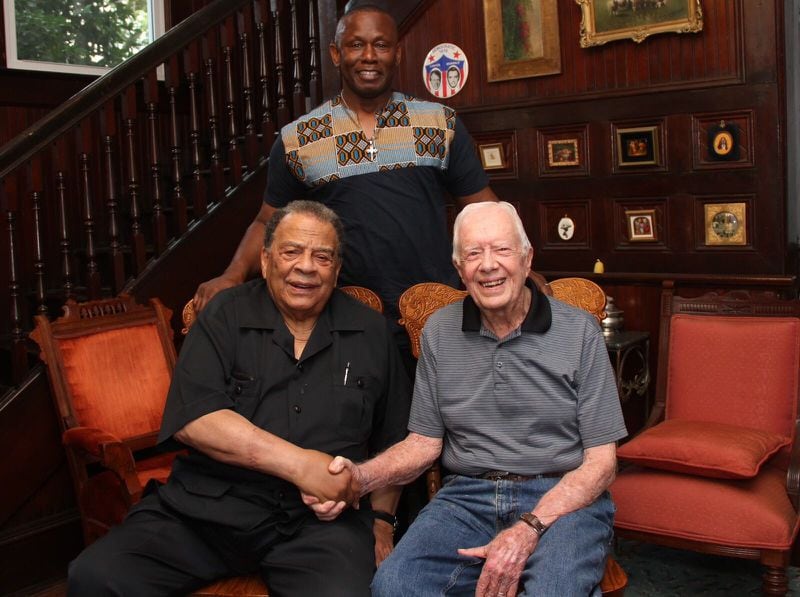 Maranatha Baptist Church Pastor Tony Lowden with Ambassador Andrew Young and former President Jimmy Carter. Young visited their church on Sunday to teach Sunday School with Carter.