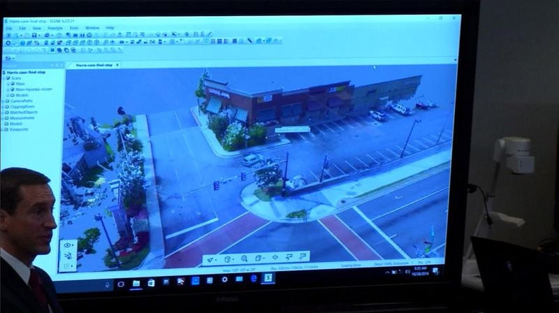Prosectuor Jesse Evans shows the jury a 3D scan of the Akers Mill Square parking lot, including Justin Ross Harris' SUV, during Harris' murder trial at the Glynn County Courthouse in Brunswick, Ga., on Friday, Oct. 28, 2016. (screen capture via WSB-TV)