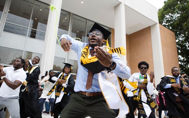 Rodney Gross leads his Alpha Phi Alpha fraternity brothers in a step routine after the Morehouse College commencement ceremony on Sunday, May 21, 2023, on Century Campus in Atlanta. The graduation marked Morehouse College's 139th commencement program. CHRISTINA MATACOTTA FOR THE ATLANTA JOURNAL-CONSTITUTION