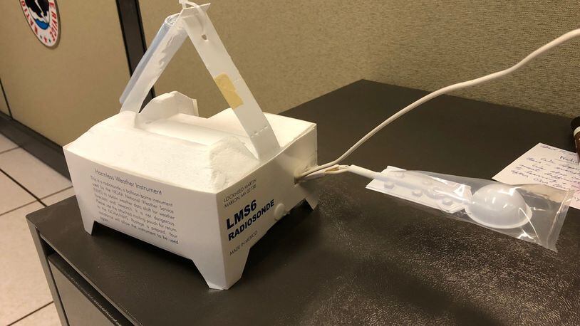 The National Weather Service attaches a radiosonde to weather balloons to record temperature, relative humidity and pressure. One of these landed in downtown Atlanta Thursday and prompted a suspicious package investigation.