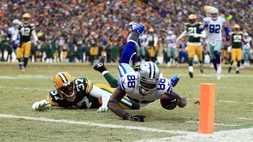 Dallas Cowboys wide receiver Dez Bryant (88) is unable to catch a pass against Green Bay Packers cornerback Sam Shields (37) in the fourth quarter in the 2014 NFC Divisional playoff football game at Lambeau Field.