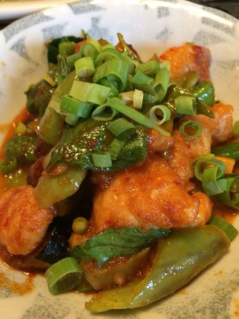 Talat Market’s dry catfish curry (“pla duk pat prik king”) is a stir-fry with eggplant, green beans, bamboo, lime basil and Thai lime leaves. CONTRIBUTED BY WENDELL BROCK