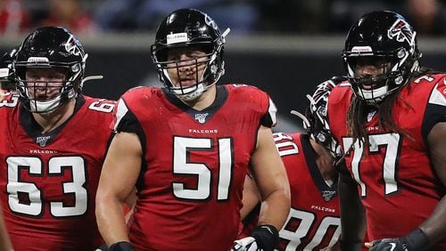 Falcons offensive lineman Chris Lindstrom (from left), Alex Mack, and James Carpenter take the line during an exhibition game against the Washington Redskins Thursday, Aug. 22, 2019, in Atlanta.