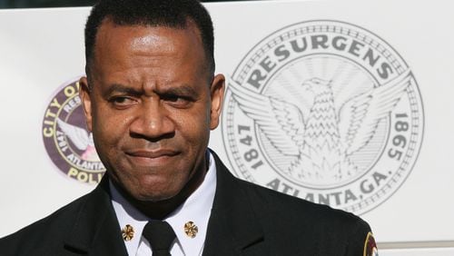 January 6, 2015 - Atlanta - Ousted Fire Chief Kelvin Cochran talks at a press conference after learning of his termination. Atlanta Mayor Kasim Reed announced the termination of embattled Fire Chief Kelvin Cochran today over fallout from his controversial book at a press conference today at City Hall. Cochran's termination follows his month-long suspension, which many in the religious right say is an affront to religious freedom. Immediately following Reed's press conference, Cochran held one of his own, outside the Public Safety Building, where he talked about his faith, having just found out he was fired. BOB ANDRES / BANDRES@AJC.COM Ousted fire chief Kelvin Cochran talks at a press conference after learning of his termination. Bob Andres, bandres@ajc.com
