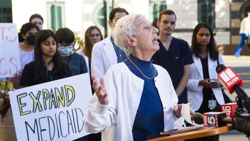Rita Valenti, RN, speaks during a press conference on Tuesday, September 27, 2022, held by doctors and healthcare professionals concerned with the closure of Atlanta Medical Center at Grady Hospital in Atlanta. Due to limited space and resources at Grady Hospital, the group called for Medicaid expansion to mitigate the effects of Atlanta Medical Center's closure. CHRISTINA MATACOTTA FOR THE ATLANTA JOURNAL-CONSTITUTION.
