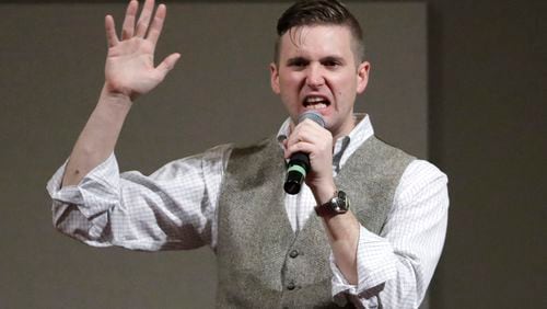 Richard Spencer, who leads a movement that mixes racism, white nationalism and populism, speaks at the Texas A&M University campus in College Station, Texas. The Internal Revenue Service has revoked the tax-exempt status of the National Policy Institute, a group run by Spencer, for its failure to file tax returns for three consecutive years. Spencer told The Los Angeles Times it was an error and that he plans to appeal. (AP Photo/David J. Phillip, File)