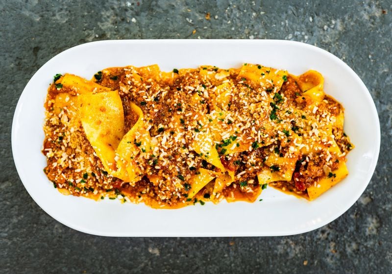 Housemade pappardelle with bolognese gravy and American parmesan is served at BoccaLupo. CONTRIBUTED BY HENRI HOLLIS