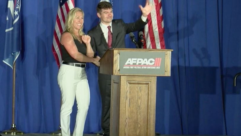 A screenshot of Rep. Marjorie Taylor Greene and Nick Fuentes, the leader of the America First Political Action Conference, from video of event shared online.