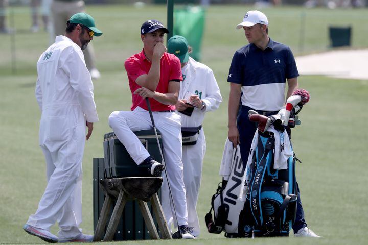 April 7, 2021, Augusta: Justin Thomas, left, and Jordan Spieth wait to hit on the fourth tee during their practice round for the Masters at Augusta National Golf Club on Wednesday, April 7, 2021, in Augusta. Curtis Compton/ccompton@ajc.com