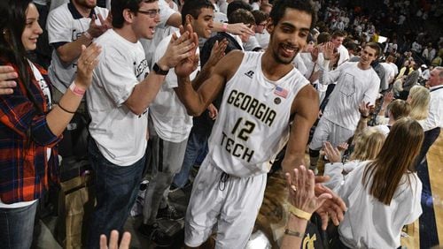 Georgia Tech forward Quinton Stephens celebrates with fans following the Jackets’ win over Syracuse Sunday at McCamish Pavilion (Special to the AJC)