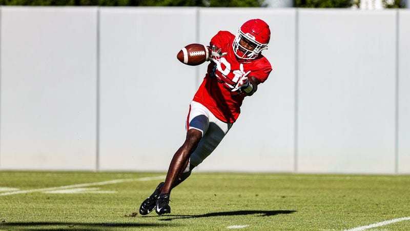 Georgia wide receiver Marcus Rosemy-Jacksaint (81) stretched out for a catch during the Bulldogs’ practice session Wednesday, Oct. 14, 2020, in Athens. (Tony Walsh/UGA)
