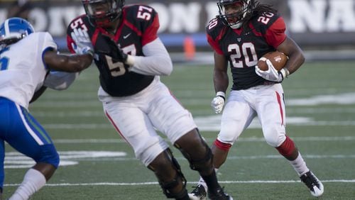 Brandon Kemp guards a running back during a Valdosta State University game. CONTRIBUTED