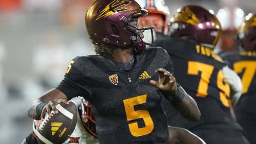 FILE - Arizona State quarterback Jaden Rashada throws a pass against Oklahoma State during the second half of an NCAA college football game Saturday, Sept. 9, 2023, in Tempe, Ariz. Rashada has committed to Georgia and is back in the Southeastern Conference after the one-time Florida commit's NIL deal fell apart. (AP Photo/Ross D. Franklin, File)