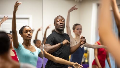 The Namari Dance Center in Sandy Springs is the home to approximately 50 dance students and is where owner and director Antwan Sessions watches for proper posture with the older students at the center. The center will travel to Africa for a collaboration performance in July 2025. (Jenni Girtman for the Atlanta Journal-Constitution)