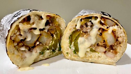 The Brookhaven can be served as a burrito (seen here), a taco or a quesadilla at Bell Street Burritos. Angela Hansberger for The Atlanta Journal-Constitution