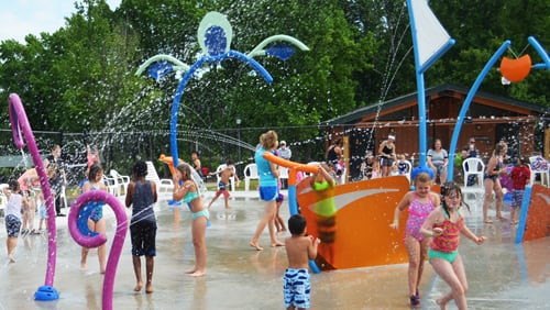 Kennesaw’s Splash Pad is open now through Sept. 2 except Thursdays. Beginning Aug. 1, the 3,200-square-foot amenity will be open only on Saturdays and Sundays but also on Sept. 2. (Courtesy of Kennesaw)