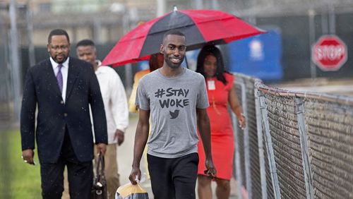 Black Lives Matter activist DeRay Mckesson leaves the Baton Rouge jail in Baton Rouge, La. on Sunday, July 10, 2016. McKesson, three journalists and more than 120 other people were taken into custody in Louisiana over the past two days, authorities said Sunday, after protests over the fatal shooting of an African-American man by two white police officers in Baton Rouge. (AP Photo/Max Becherer)