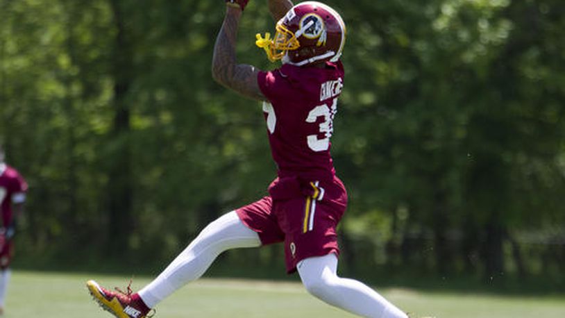 Washington Redskins safety Su'a Cravens, 36, works out during NFL football rookie minicamp Saturday, May 14, 2016, in Ashburn, Va. ( AP Photo/Jose Luis Magana)