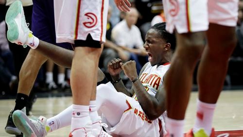 Atlanta Hawks’ Taurean Prince reacts after drawing the foul while scoring a basket in the fourth quarter of an NBA basketball game against the Phoenix Suns in Atlanta, Tuesday, March 28, 2017. Atlanta won 95-91. (AP Photo/David Goldman)