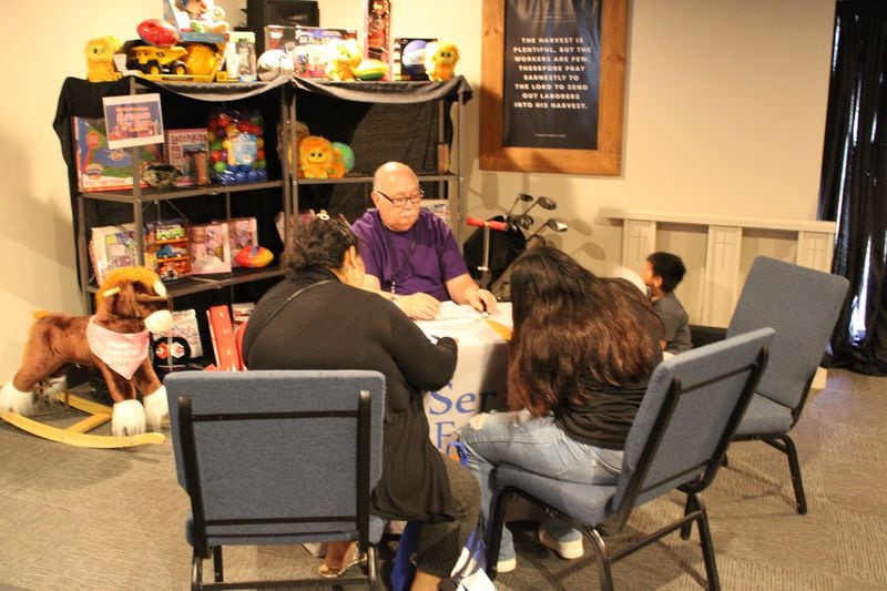 Pictured are clients receiving services at Ser Familia which provides family, social and mental health services to the Latino community. The nonprofit currently has 6,000 clients, a 30% increase since 2020. Courtesy Ser Familia