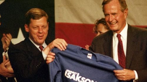 U.S. Sen. Johnny Isakson and George H.W. Bush in 1990, when Isakson was running for governor. AJC file.