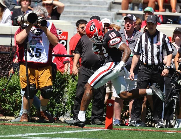 Wide receiver Sacovie White breaks away to the end zone for a touchdown to give the black team a 17-13 lead during the G-Day game on Saturday, April 13, 2024.  Curtis Compton for the Atlanta Journal Constitution