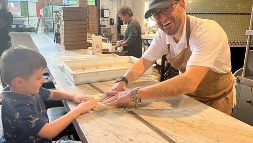 Patrizio Alaia of Mozza Bella will help young guests shape a bit of dough, and then he'll bake it for them. Courtesy of Mozza Bella