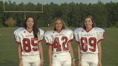 Kickers Kholi Carruth (85), Gianna Anderson (42) and Carly Carruth (89) will be the first female football players in Lincoln County history.