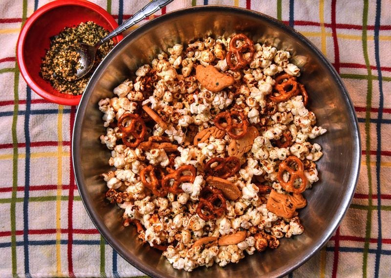 If you're watching a movie with a tropical setting, get in the spirit of things with Hawaiian-inspired Hurricane Popcorn. (Styling by Susan Puckett / Chris Hunt for the AJC)