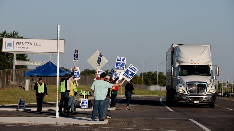Members of the United Auto Workers union stand on the picket line outside the Wentzville General Motors plant on Friday, Sept. 15, 2023. (David Carson/St. Louis Post-Dispatch/TNS)