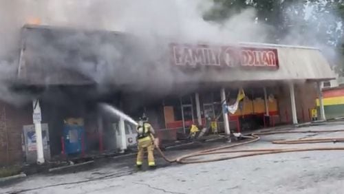 Crews began putting out the fire at the Family Dollar store about 11:30 a.m.