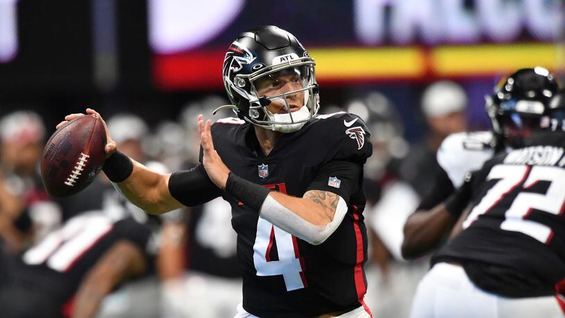 Falcons quarterback Desmond Ridder gets off a pass during the first half of the final exhibition game of the preseason at Mercedes-Benz Stadium in Atlanta at on Saturday, August 27, 2022. (Hyosub Shin / Hyosub.Shin@ajc.com)