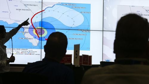 The Federal Emergency Management Agency (FEMA) Regional Response Coordination Center in DeKalb County monitored Hurricane Matthew’s progress on Friday, Oct. 7, 2016. JOHN SPINK /JSPINK@AJC.COM