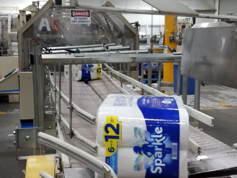 Sparkle paper towels roll down a Georgia-Pacific production line in Alabama. The Atlanta-based company is an industry leader in the production of tissue papers.