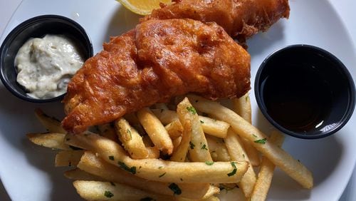 The Porter Beer Bar’s fish and chips comes with beer-battered cod, Belgian fries, pickled green tomato tartar sauce and malt vinegar. Bob Townsend for The Atlanta Journal-Constitution.