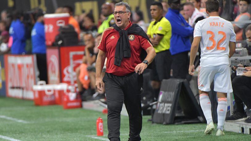 July 21, 2018  - Atlanta United head coach Gerardo Martino shouts instructions during the second half in a MLS soccer game at Mercedes-Benz Stadium on Saturday, July 21, 2018. Three more goals from Josef Martinez set a new MLS record lifted Atlanta United to a 3-1 victory over D.C. United on Saturday at Mercedes-Benz Stadium. HYOSUB SHIN / HSHIN@AJC.COM