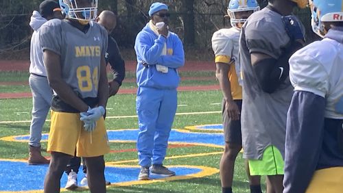 Mays coach Tony Slaton watches the Raiders as they prepare for the quarterfinal game with Dutchtown, Nov. 25, 2022.