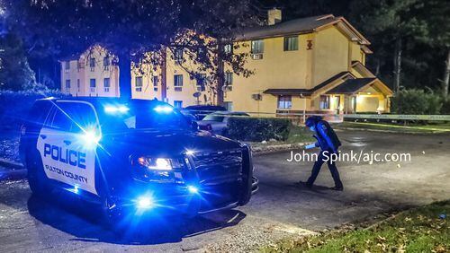 Fulton County police responded to a shooting that injured a Cobb County officer Tuesday morning at the Super Inn on Fulton Industrial Boulevard.