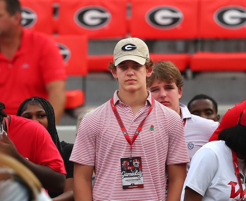 Recruit Arch Manning stands on the sideline wearing a Georgia hat watching Georgia prepare to play South Carolina in a NCAA college football game on Saturday, Sept 18, 2021, in Athens.    “Curtis Compton / Curtis.Compton@ajc.com”