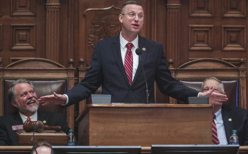 U.S. Rep. Doug Collins, center, addresses the Georgia House on Tuesday, Jan. 28, 2020 as its Chaplin of the day. Just hours before, news broke that Collins was preparing to challenge U.S. Sen. Kelly Loeffler. JOHN SPINK/JSPINK@AJC.COM