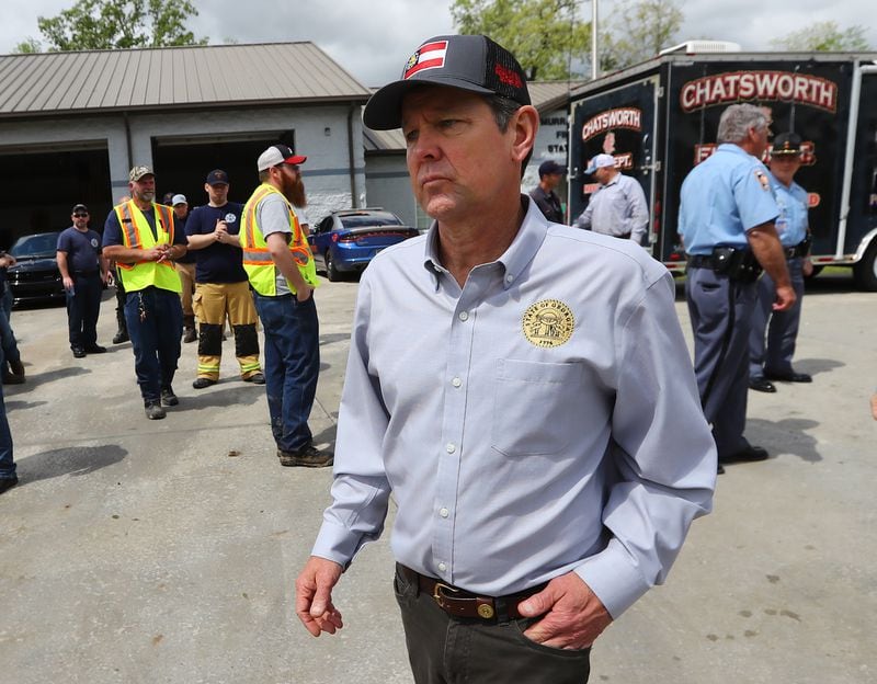 April 13, 2020 Chatsworth: Gov. Brian Kemp departs after thanking first responders while touring the scene of a deadly tornado that killed at least 7 in Murray County on Monday, April 12, 2020, in Chatsworth.